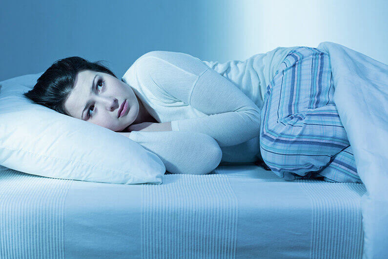Young woman is scared in the night