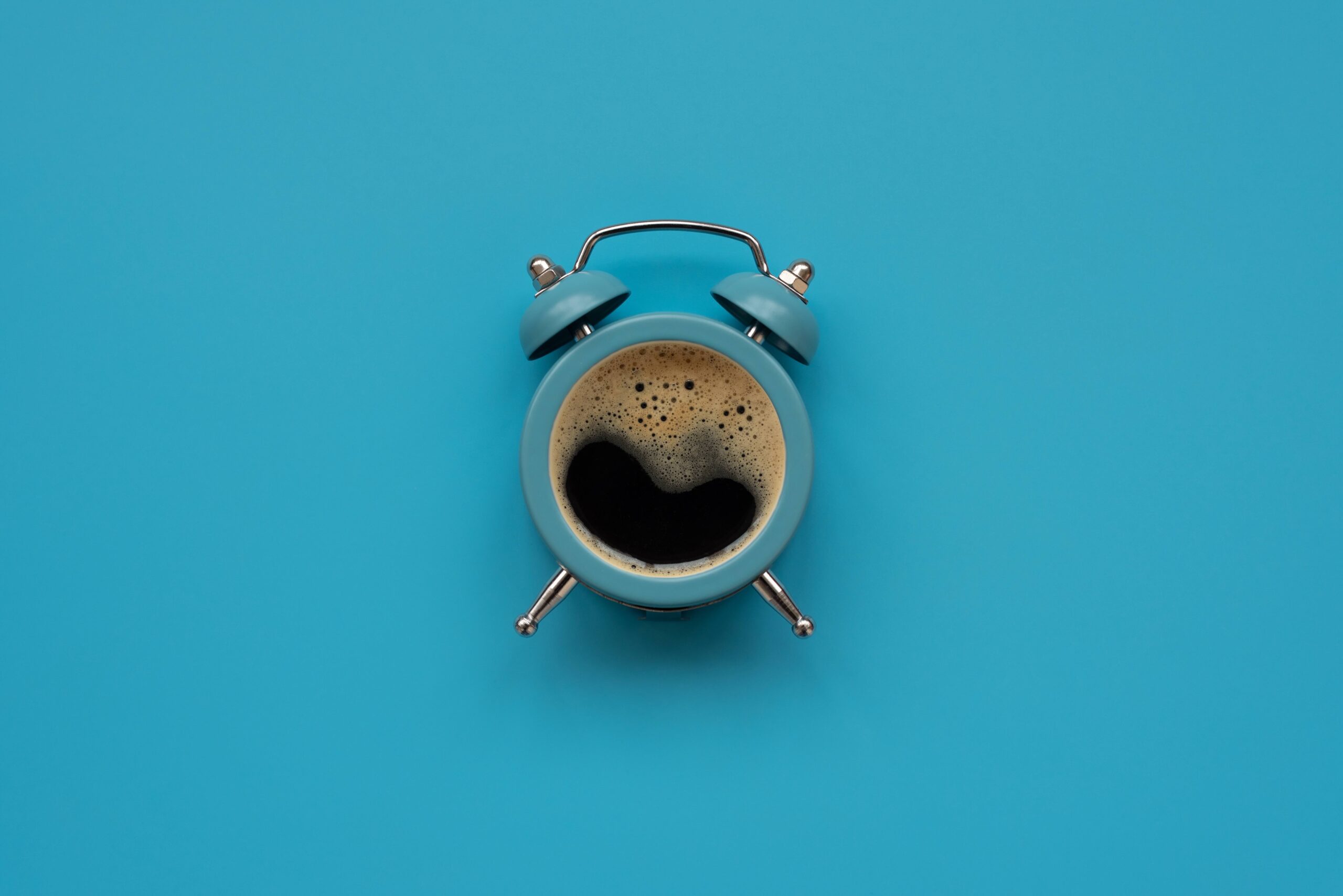 Kaffe als Uhr. Thema: Wann Kaffee trinken?